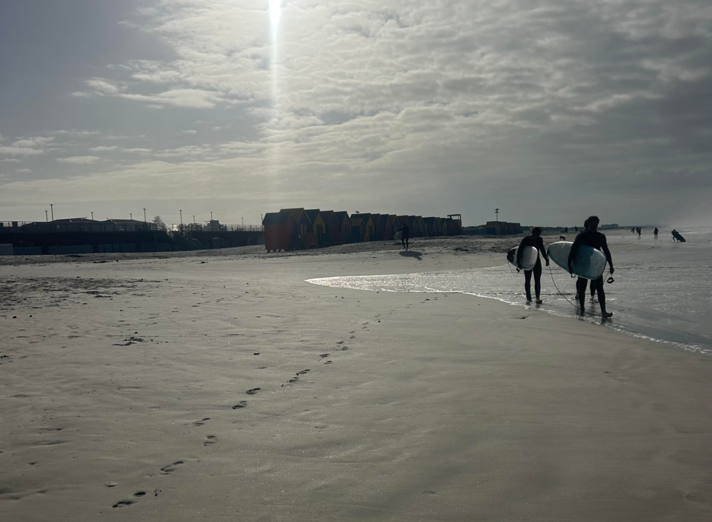Surfers at Muizenberg Beach