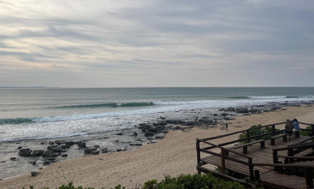 Surfers and surfing viewing platform in Jeffrey's Bay