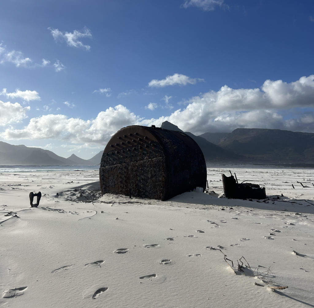 Ruins of a shipwreck on Noordhoek beach at the end of Chapman's Peak Drive