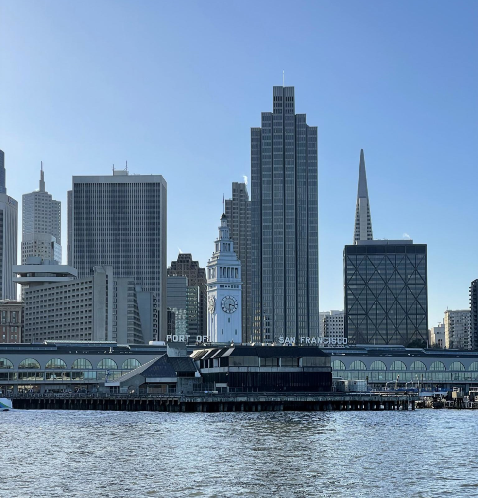 The view of the Ferry Building against the San Francisco skyline from the Bay.