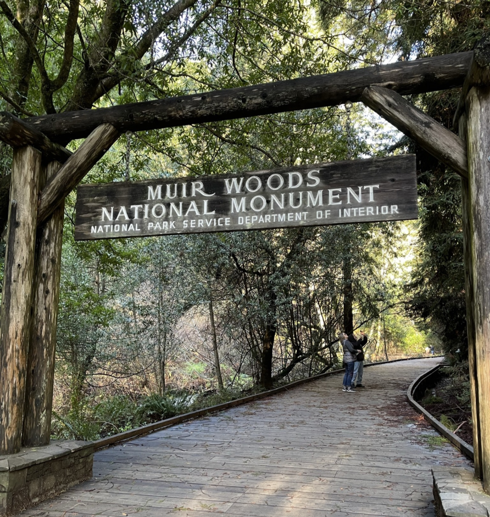 Sign saying "Muir Woods National Monument National Park Service Department of Interior" at Muir Woods on a day trip during the 5-Day San Francisco Itinerary.
