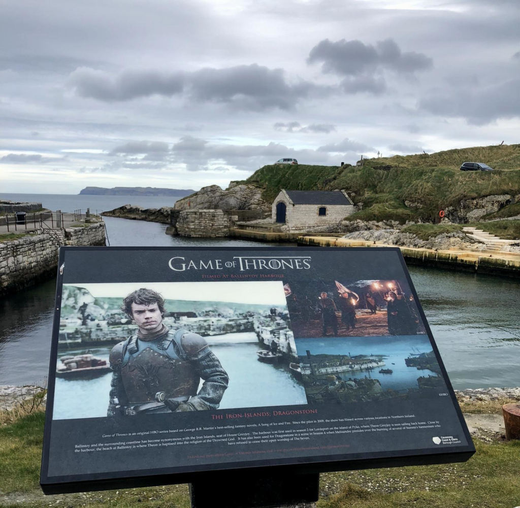 A board depicting the Game of Thrones scenes filmed at Ballintoy Harbour in Northern Ireland.